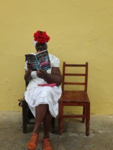 Cuban_Woman_with_Book_Cubicle_to_Cuba