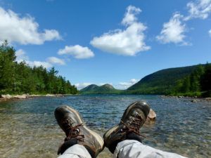 Jordan_Pond_with_feet_in_Acadia_National_Park_Maine