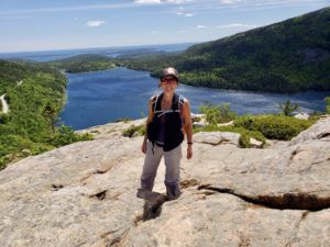 Heidi_Siefkas_atop_South_Bubble_overlooking_Jordan_Pond_Acadia_National_Park_Maine