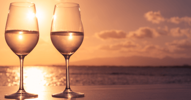 two-wine-glasses-sunset