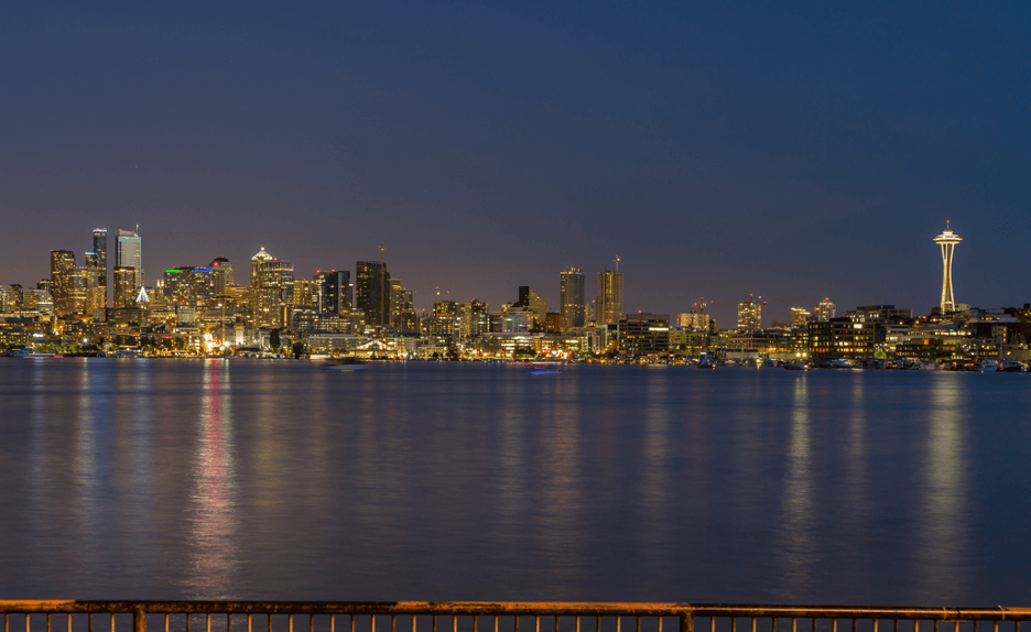 View of the Seattle skyline at night as seen from across Lake Union